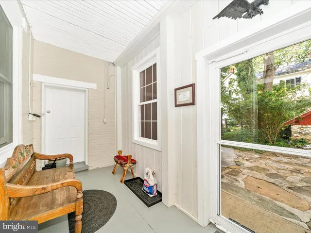 a house with swimming pool in front of it