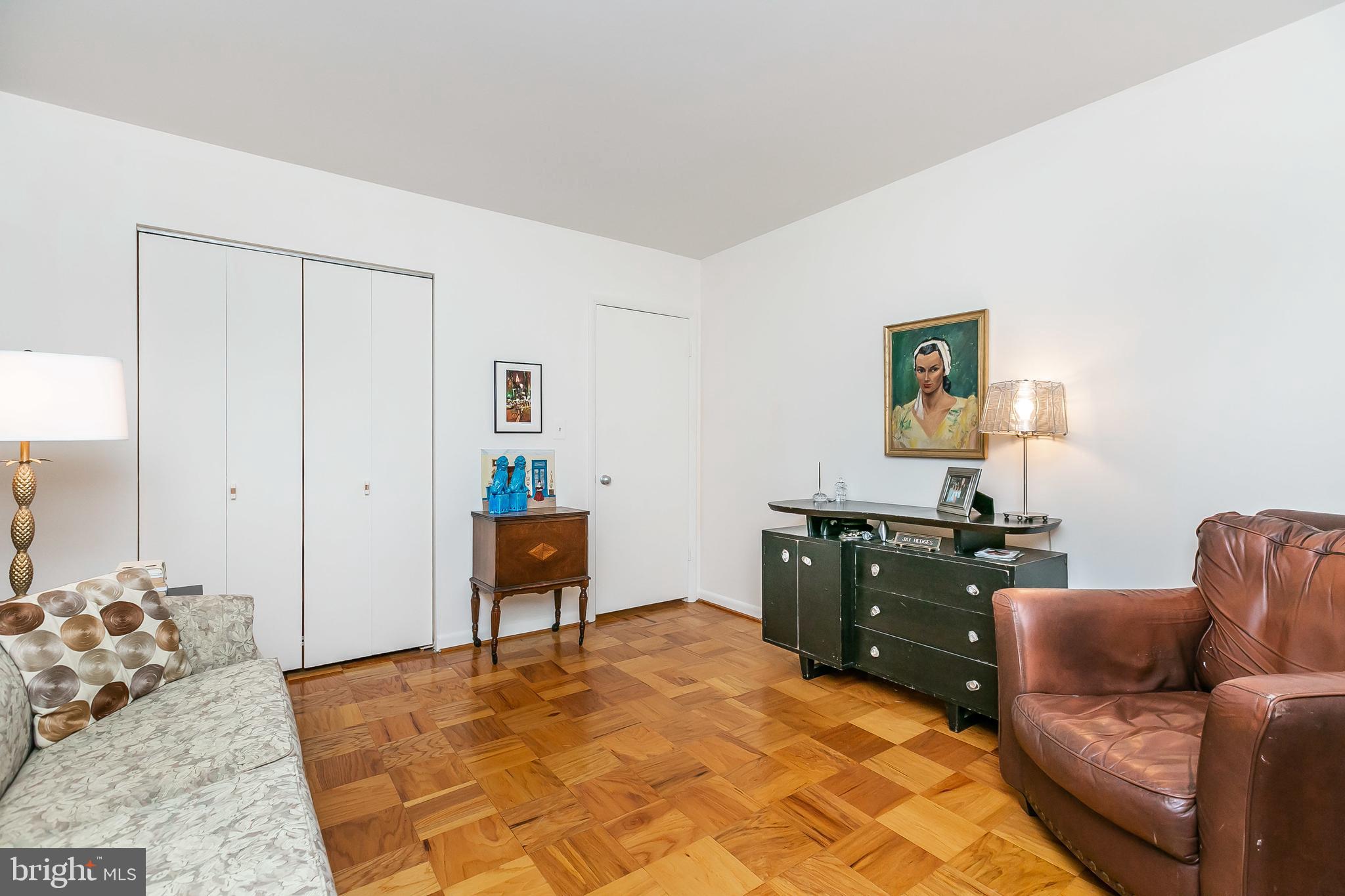 11 Cross Keys Road, Unit 11D Baltimore, MD 21210 - Photo 15 of 29 2nd bedroom with double closet & parquet floors
