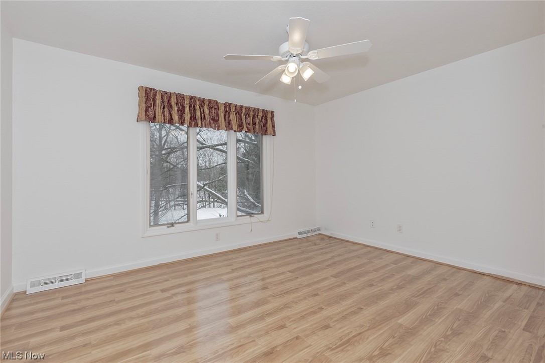 3850 Ellendale Road Moreland Hills, OH 44022 - Photo 29 of 39 Bedroom features ceiling fan and pergolal flooring