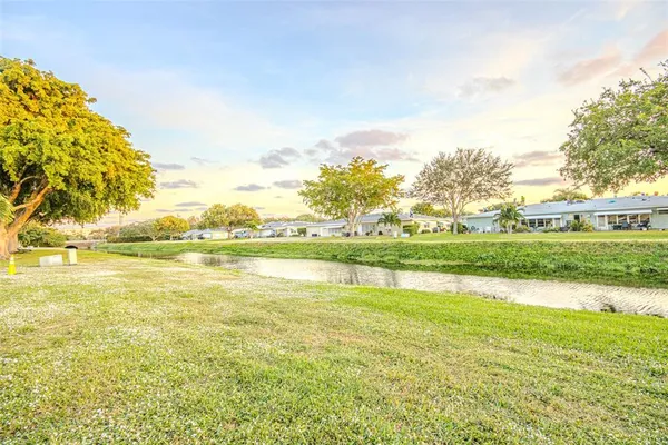 a view of an ocean with a mountain