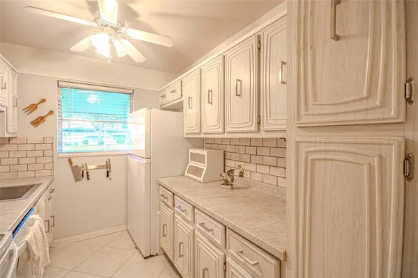 a bathroom with a sink a vanity and a mirror
