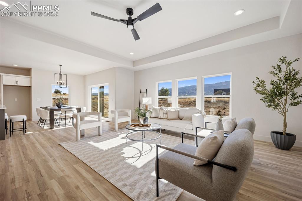 442 Gold Canyon Road Canon City, CO 81212 - Photo 11 of 38 a living room with furniture and a potted plant