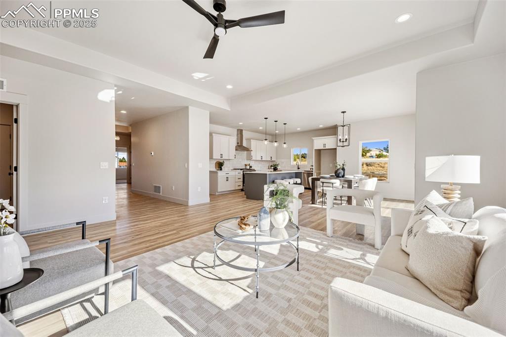 442 Gold Canyon Road Canon City, CO 81212 - Photo 12 of 38 a living room with furniture and a view of kitchen