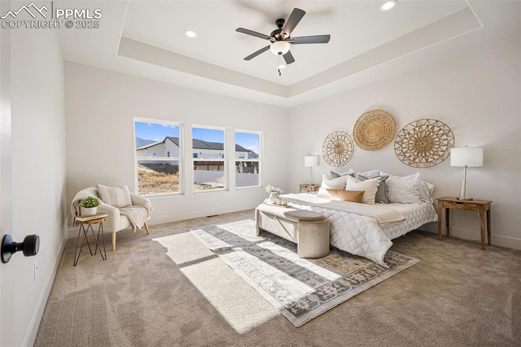 442 Gold Canyon Road Canon City, CO 81212 - Photo 13 of 38 a living room with furniture a rug and a window
