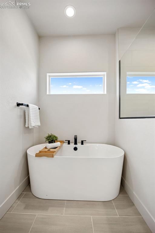 442 Gold Canyon Road Canon City, CO 81212 - Photo 16 of 38 a white bath tub sitting in a bathroom