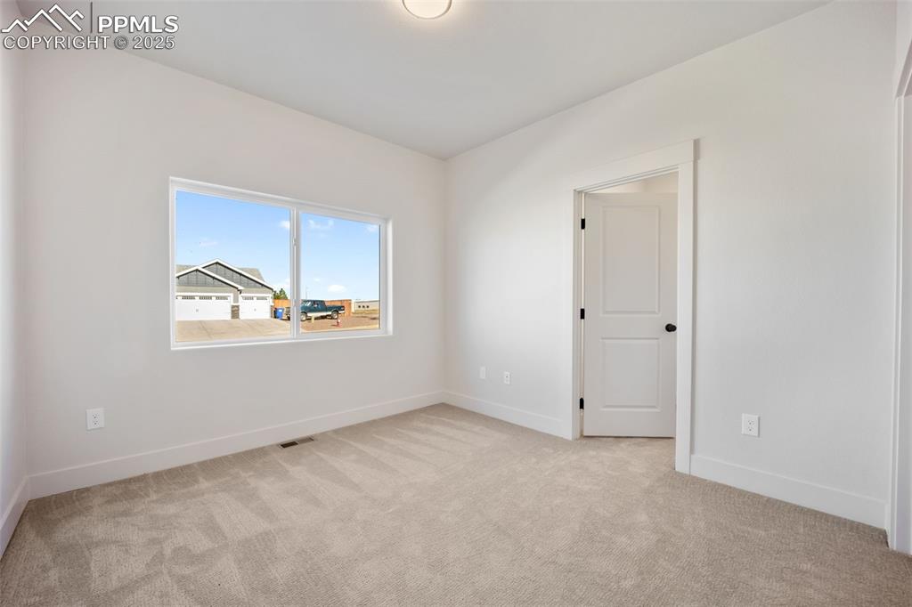 442 Gold Canyon Road Canon City, CO 81212 - Photo 21 of 38 a view of an empty room with a window
