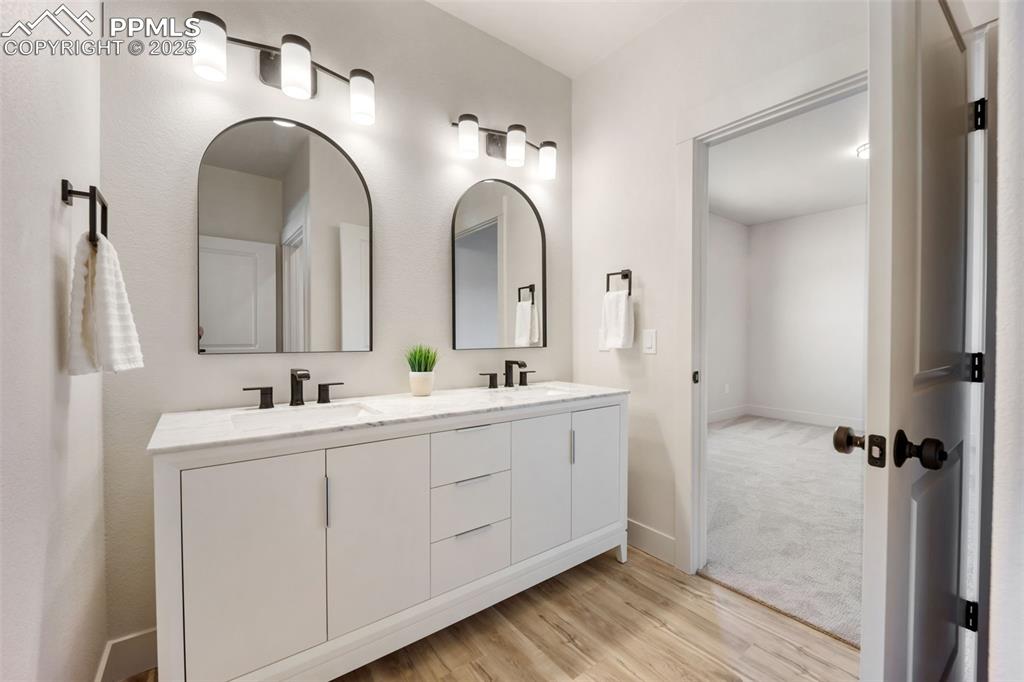 442 Gold Canyon Road Canon City, CO 81212 - Photo 25 of 38 a bathroom with double vanity sinks and a shower