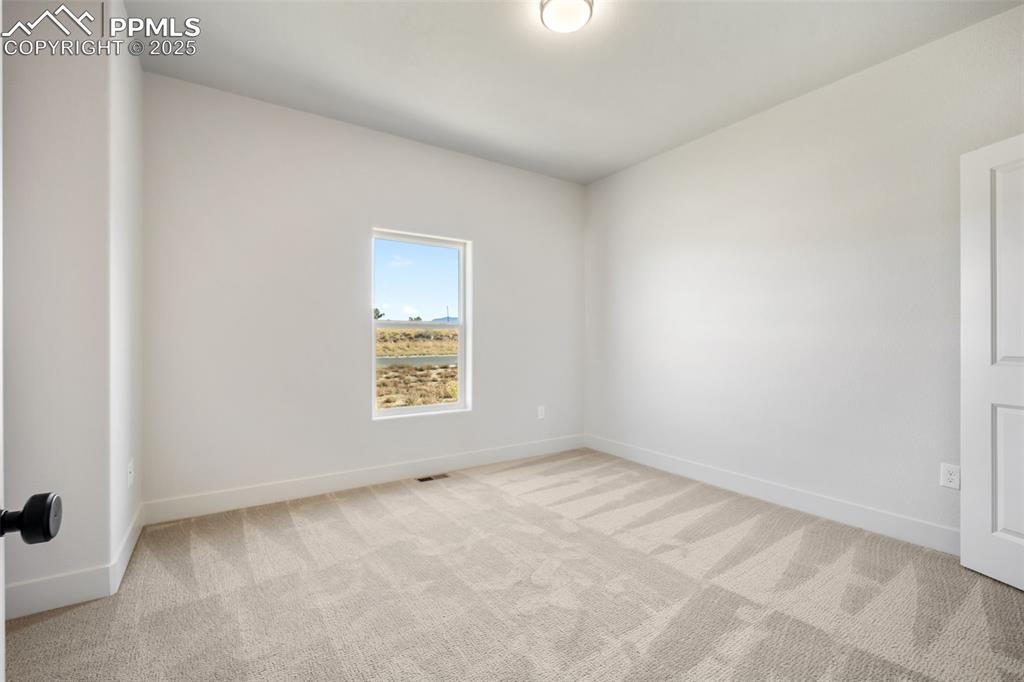 442 Gold Canyon Road Canon City, CO 81212 - Photo 26 of 38 a view of an empty room with a window