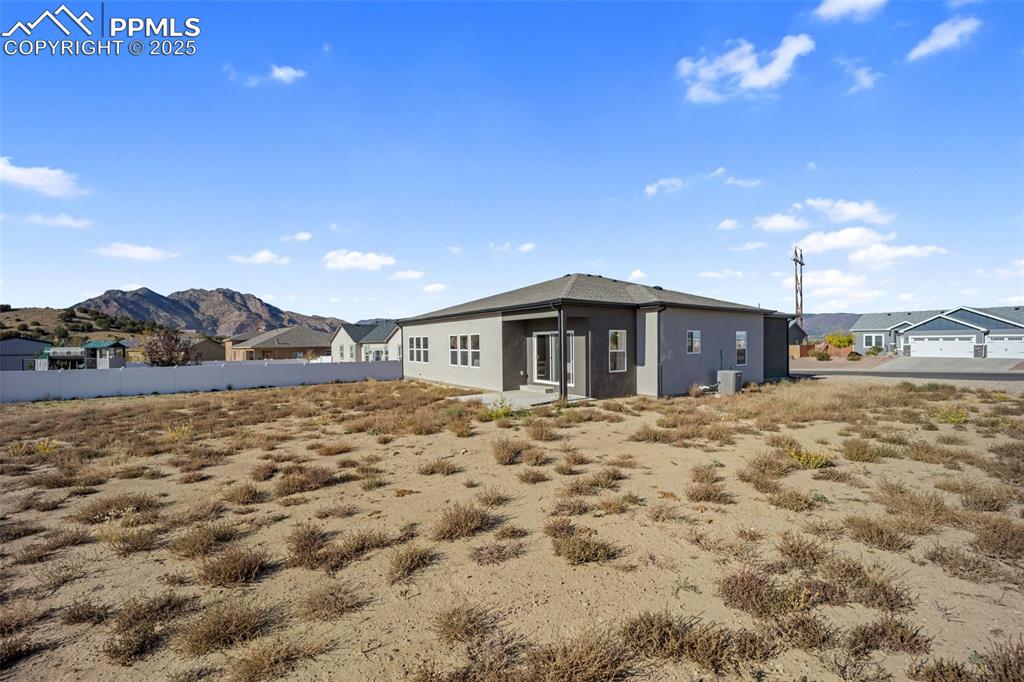 442 Gold Canyon Road Canon City, CO 81212 - Photo 31 of 38 a view of a house with a yard