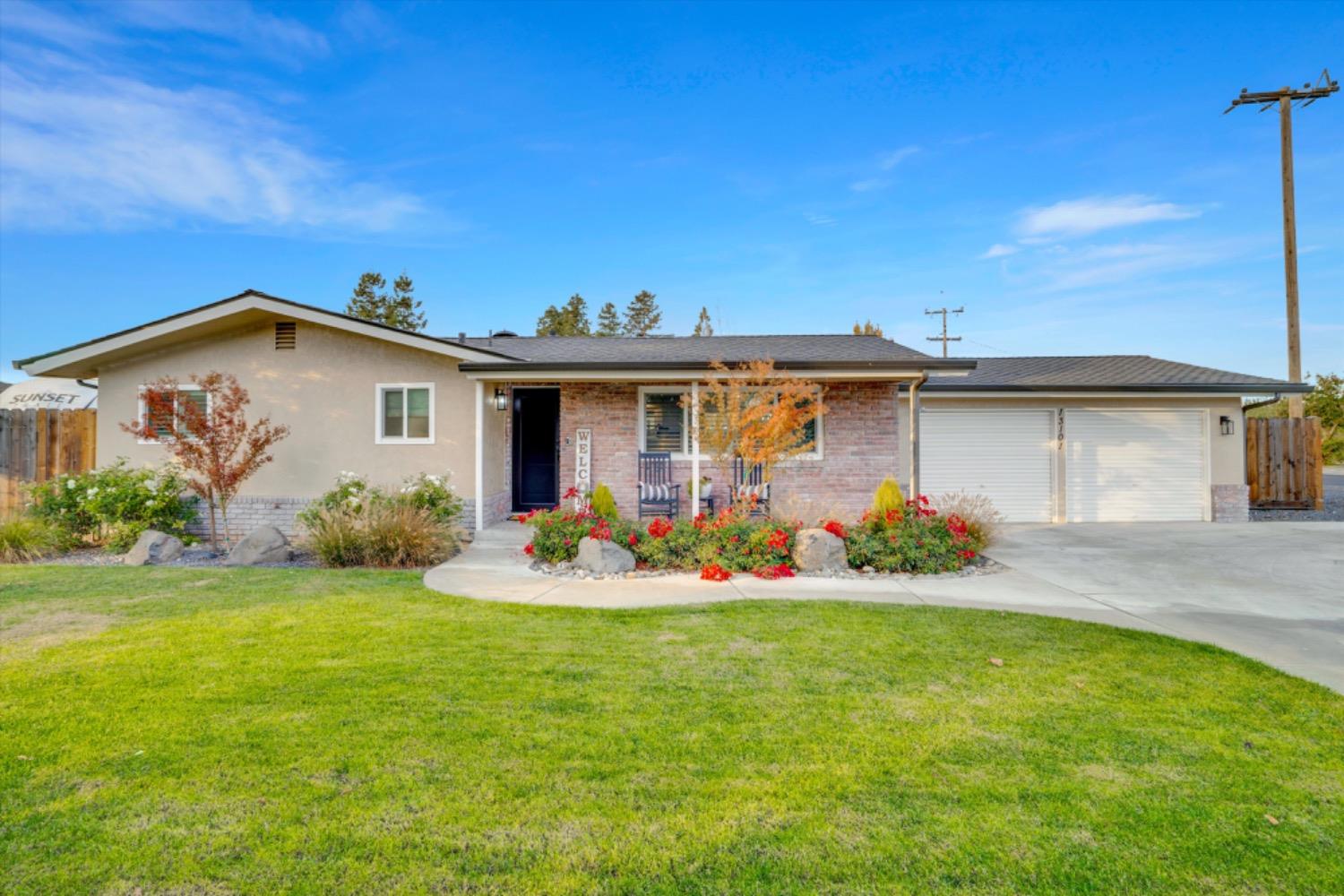 13101 West Ripon Road Ripon, CA 95366 - Photo 1 of 1 a view of an house with backyard space and balcony