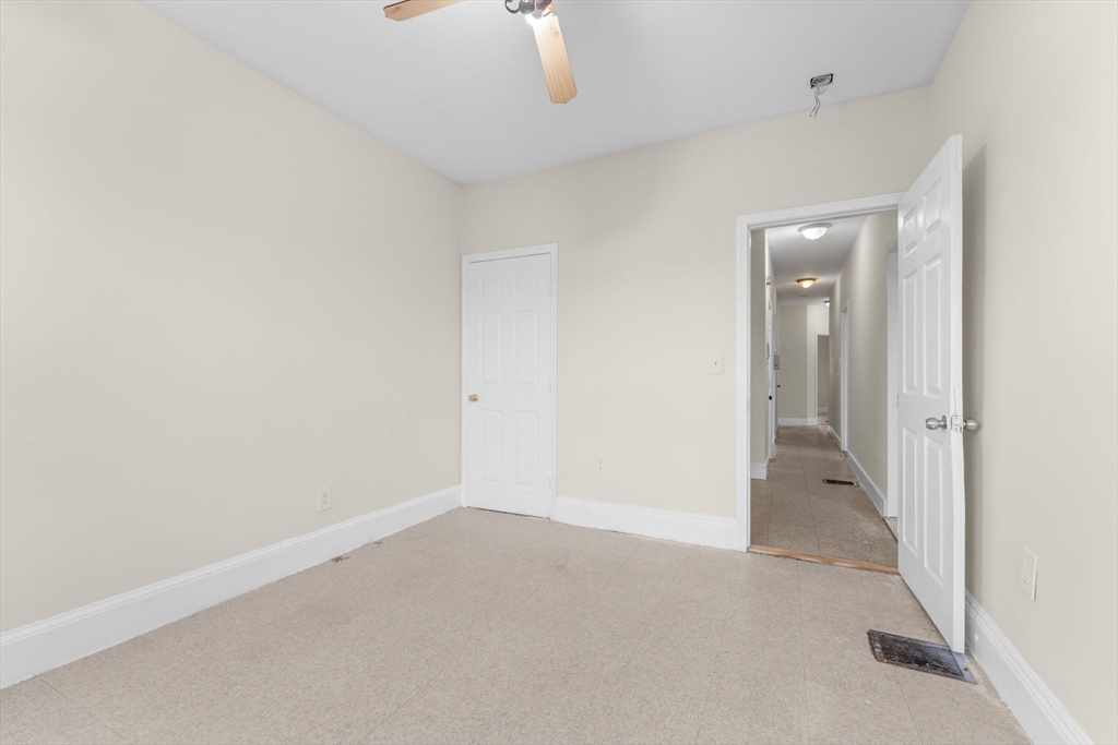 239 Bowdoin Street, Unit 3 Boston, MA 02122 - Photo 4 of 20 an empty room with a natural light