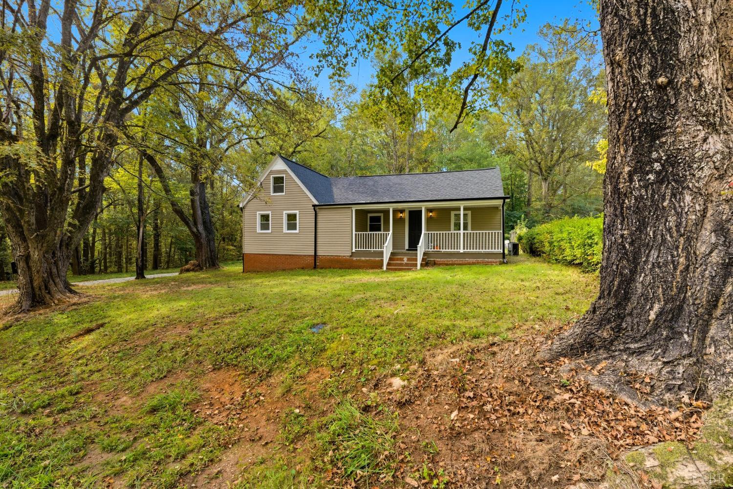288 Moses Mill Road Chatham, VA 24531 - Photo 31 of 42 front view of a house with a yard