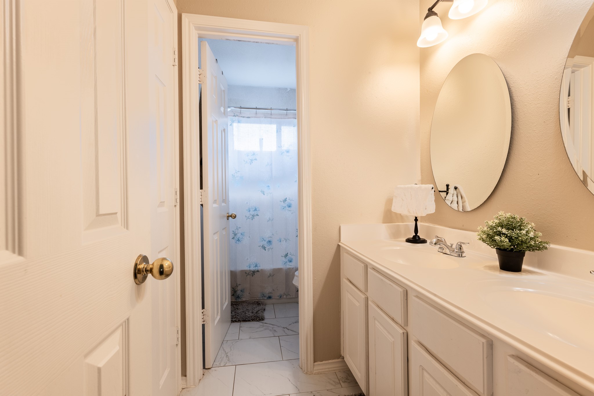 17323 Dakota Ridge Drive Houston, TX 77095 - Photo 17 of 25 a bathroom with a sink and mirror