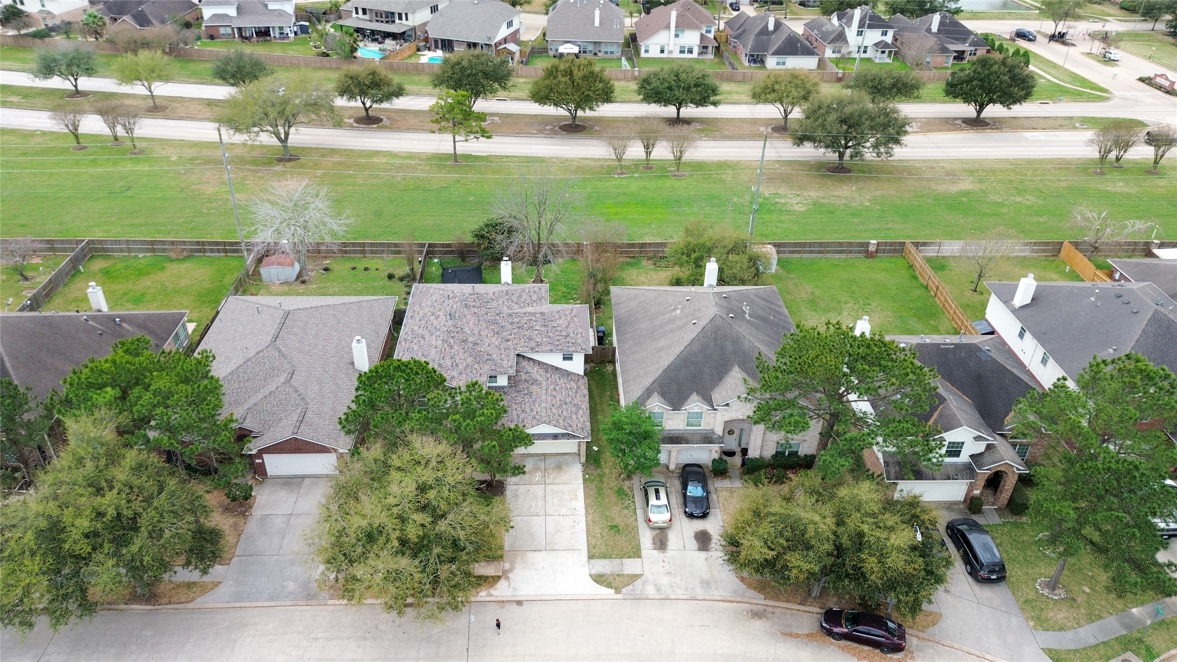 17323 Dakota Ridge Drive Houston, TX 77095 - Photo 4 of 25 an aerial view of residential houses with outdoor space and lake view