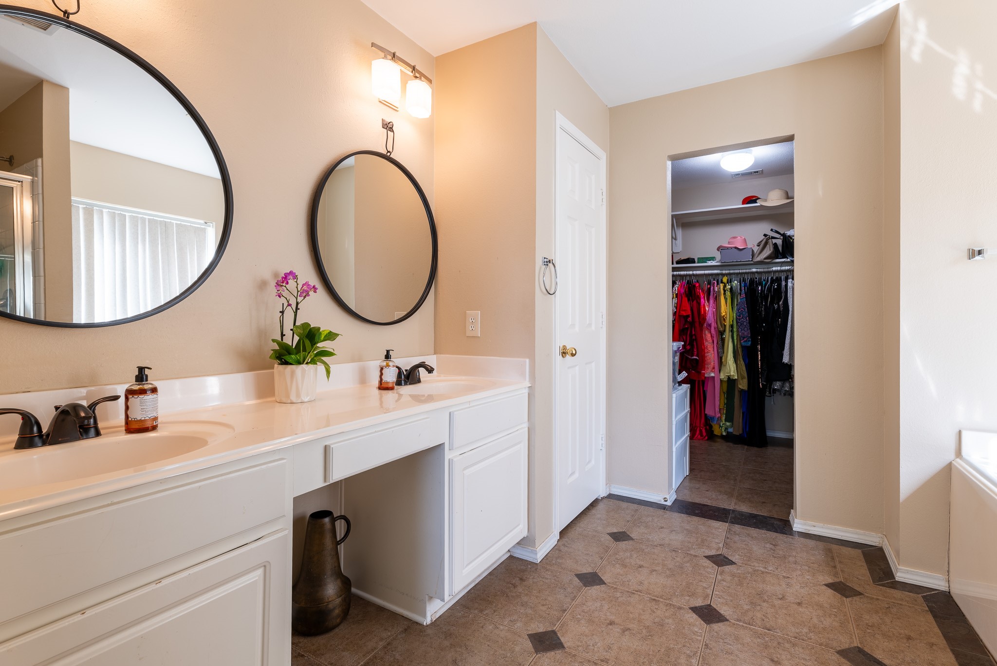 17323 Dakota Ridge Drive Houston, TX 77095 - Photo 9 of 25 a bathroom with a sink and a mirror