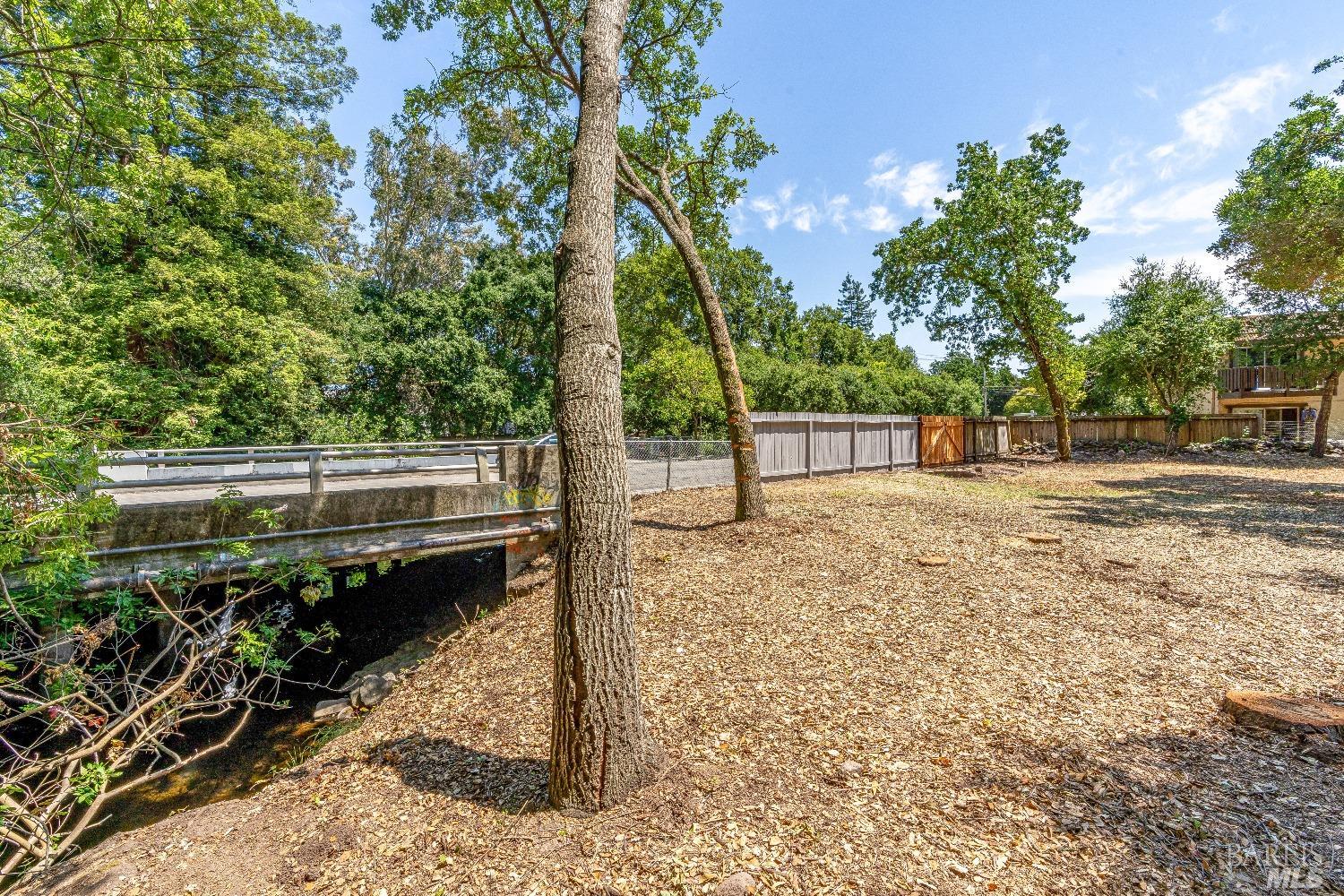 0 Bridgewood Drive Santa Rosa, CA 95404 - Photo 11 of 30 a backyard of a house with barbeque oven
