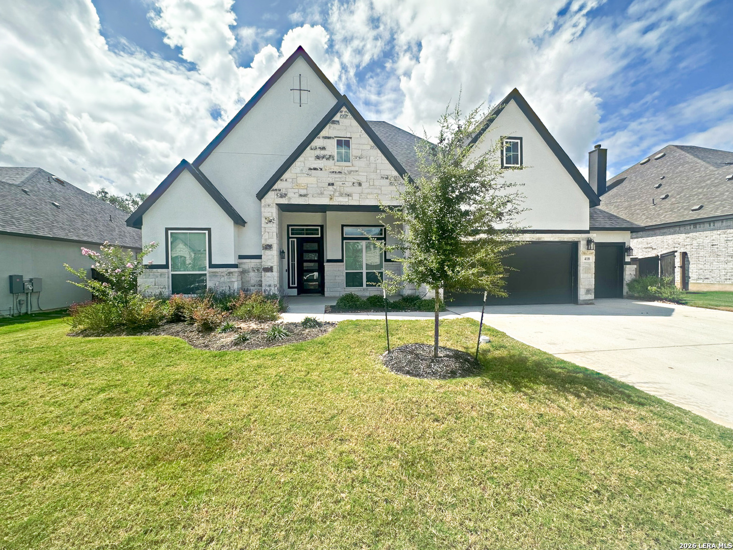 418 Corwin Springs Cibolo, TX 78108 - Photo 2 of 24 a front view of a house with a yard