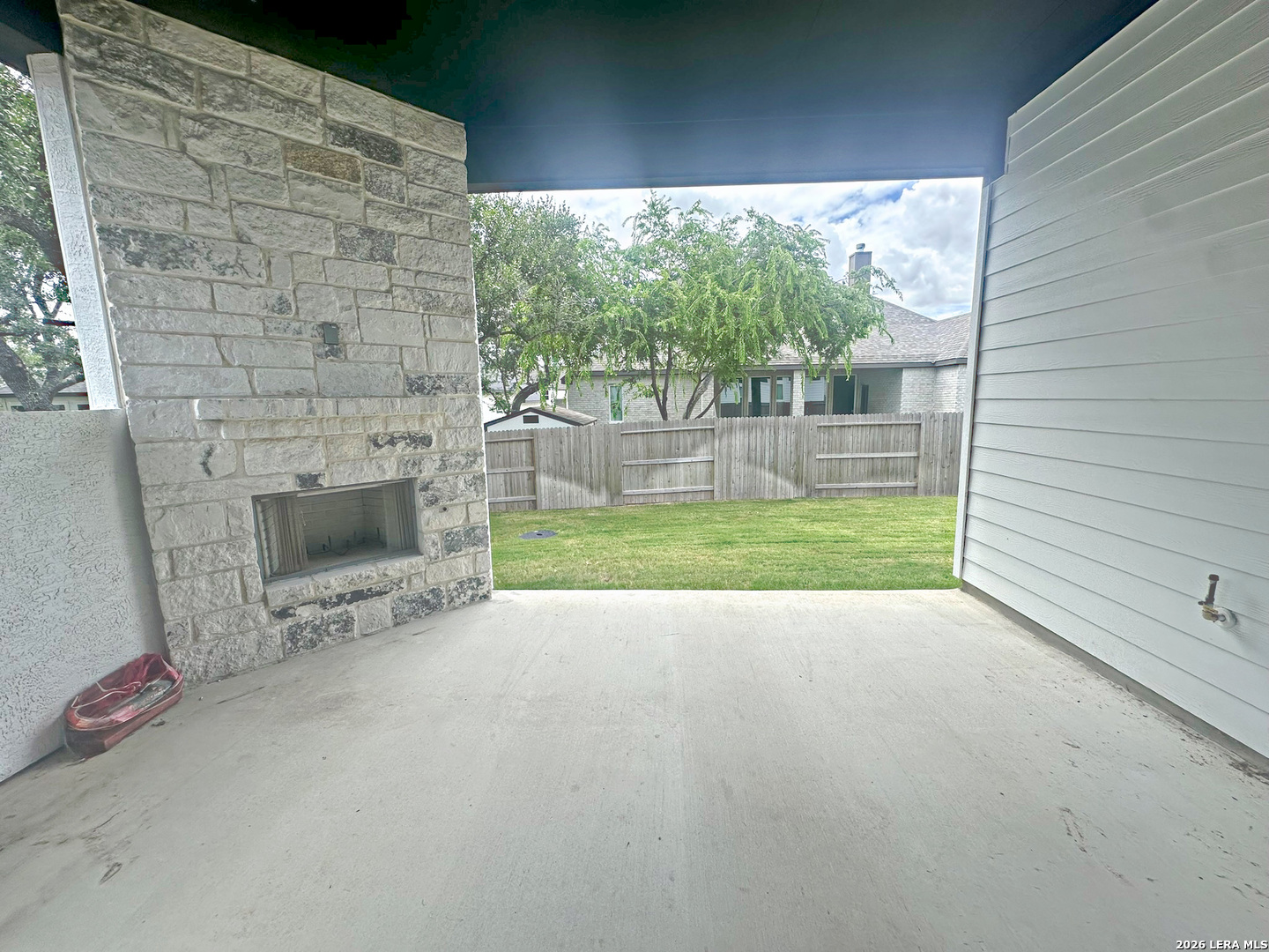 418 Corwin Springs Cibolo, TX 78108 - Photo 23 of 24 a view of an outdoor space with a fireplace