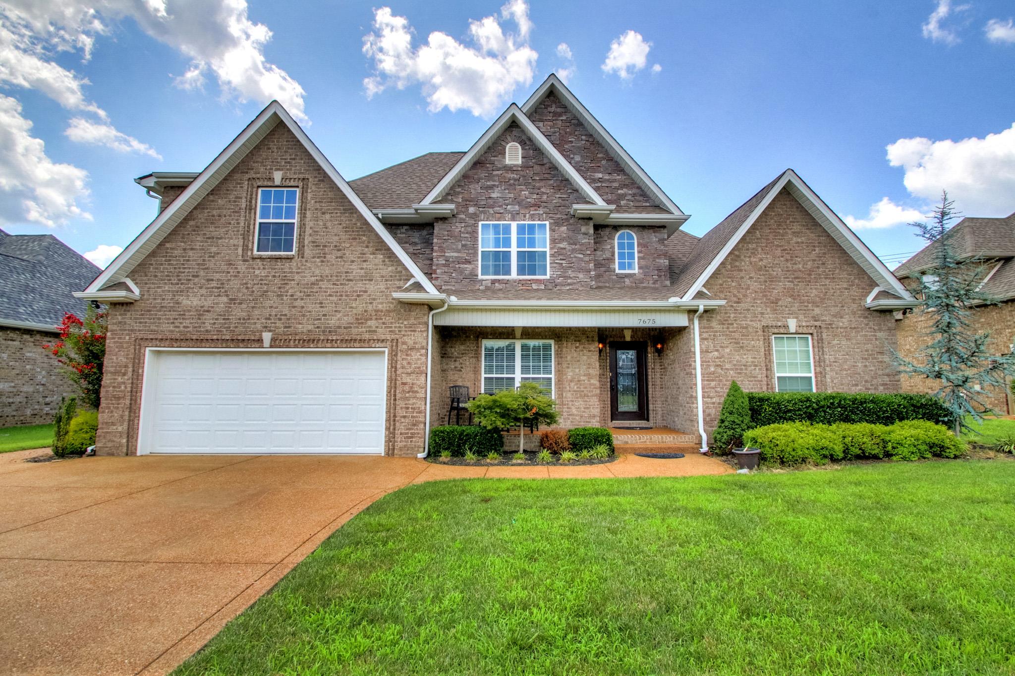 7675 Knobdate Road Smyrna, TN 37167 - Photo 1 of 26 Curb appeal is what you'll see as you drive into the driveway. Full brick home with stone accents.