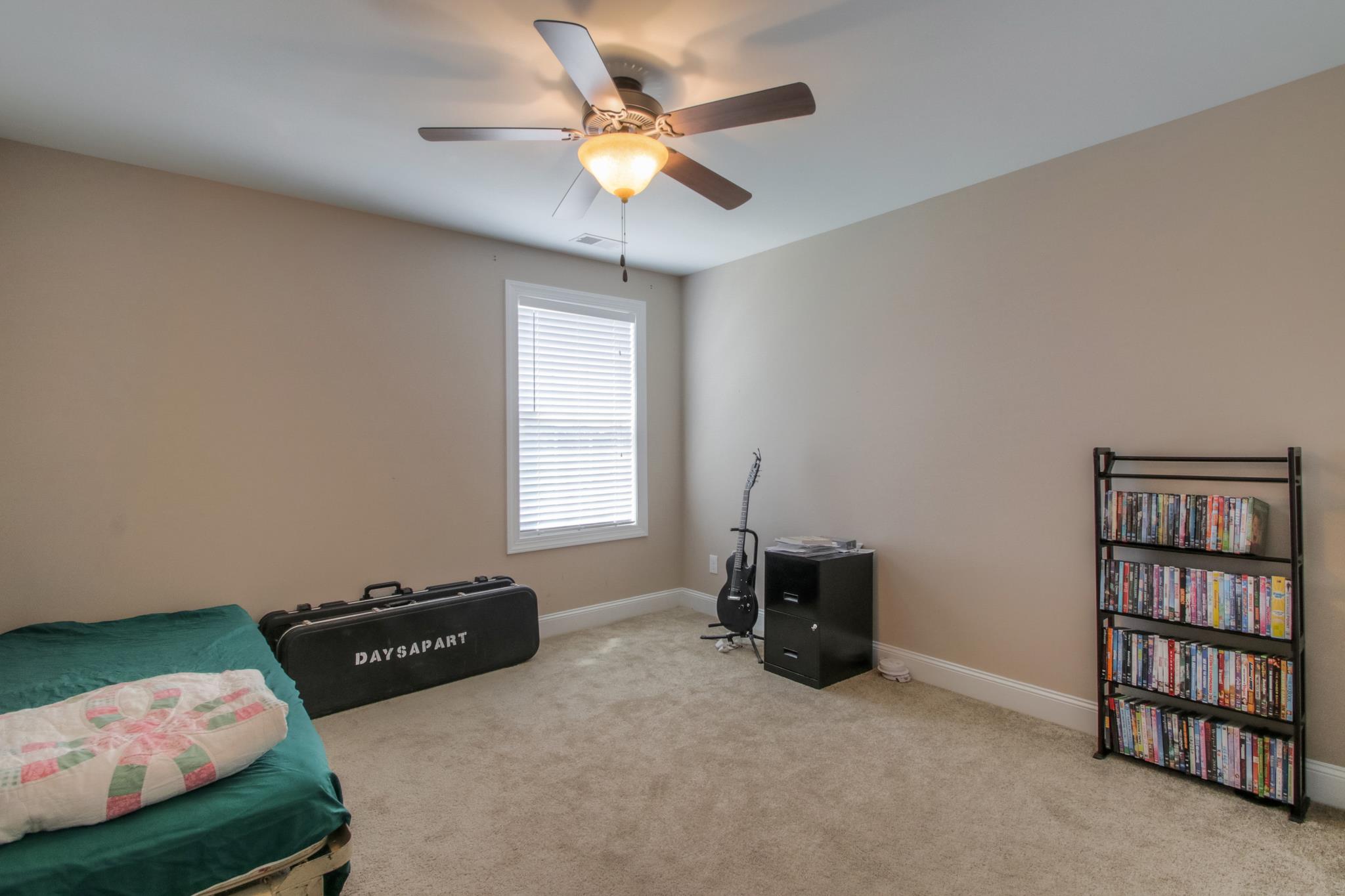 7675 Knobdate Road Smyrna, TN 37167 - Photo 19 of 26 An example of one of the 3 secondary bedrooms upstairs.