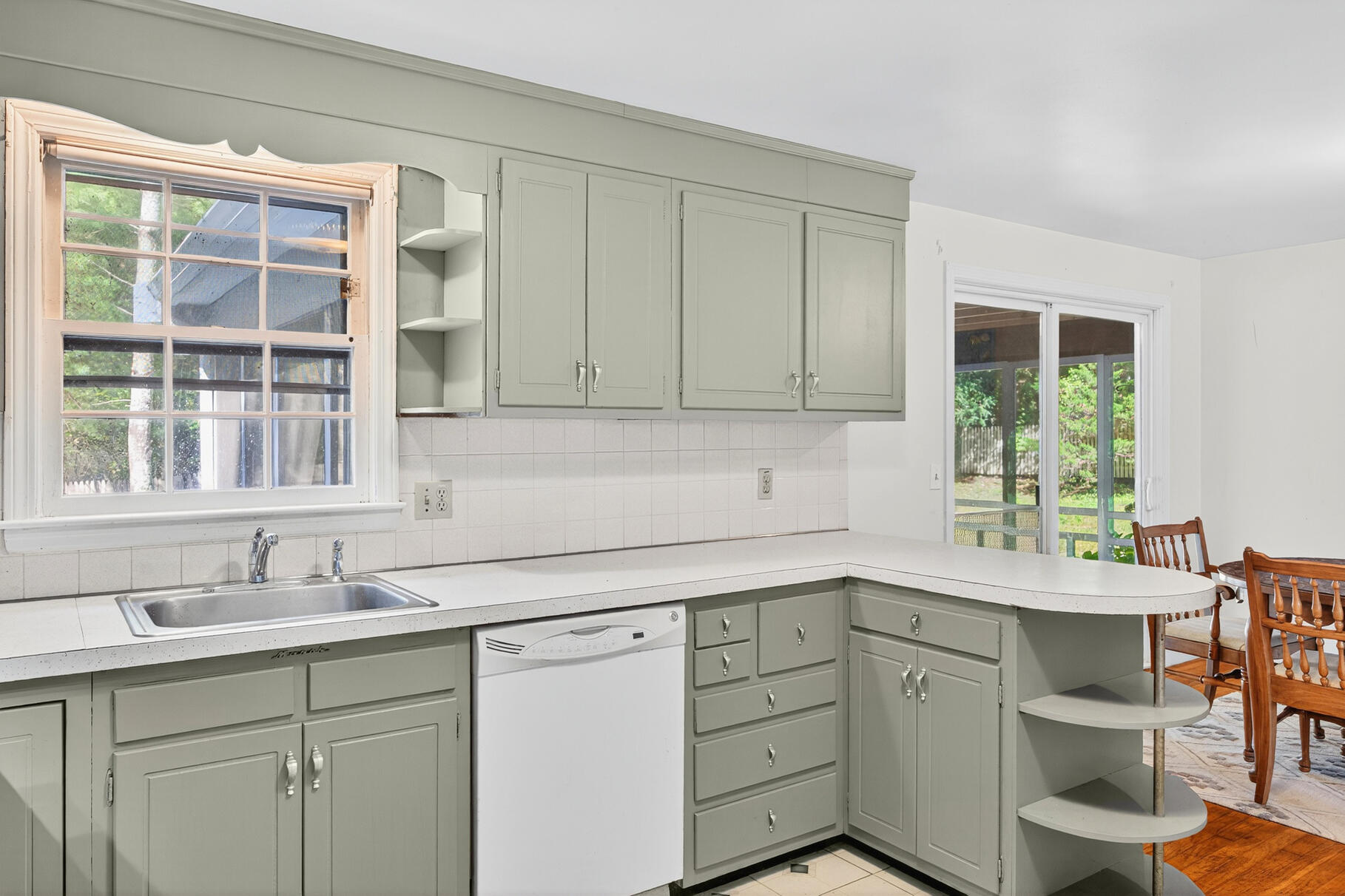 101 Longfellow Drive Centerville, MA 02632 - Photo 13 of 27 a kitchen with sink cabinets and a window