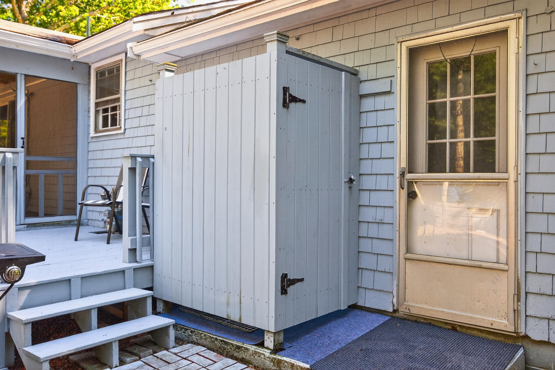 101 Longfellow Drive Centerville, MA 02632 - Photo 23 of 27 a view of a house with a door and a window