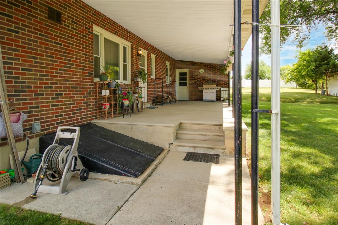 1256 Ridge Avenue Whitehall, PA 18052 - Photo 7 of 43 A spacious covered patio offers ample room for outdoor relaxation and entertaining.