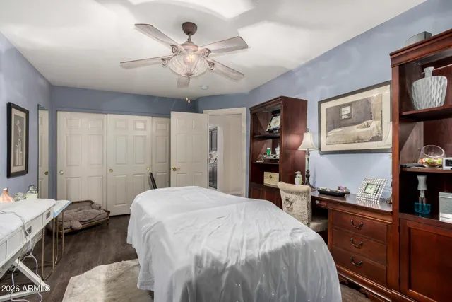a view of a chairs and a table in the balcony