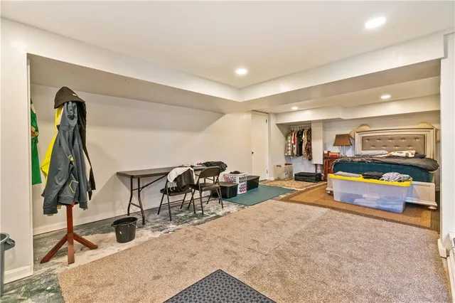 a bed room with a bed and furniture