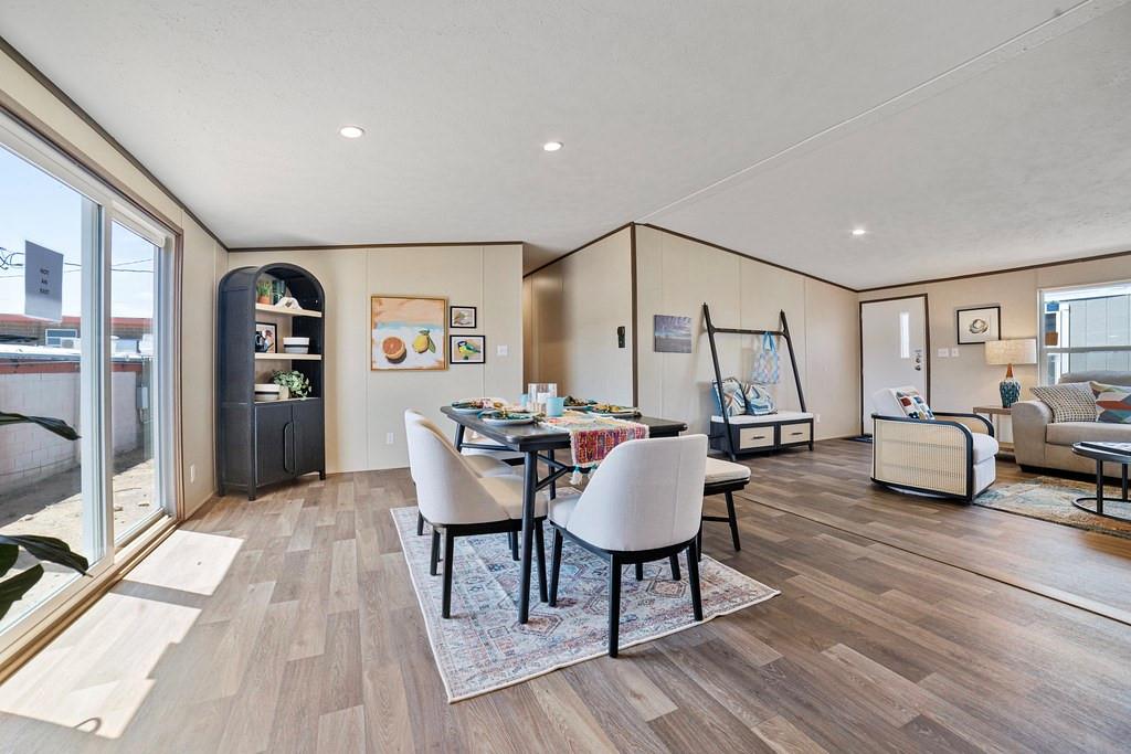 284 Pine Grove Road Gordonville, TX 76245 - Photo 16 of 29 a living room with furniture and wooden floor