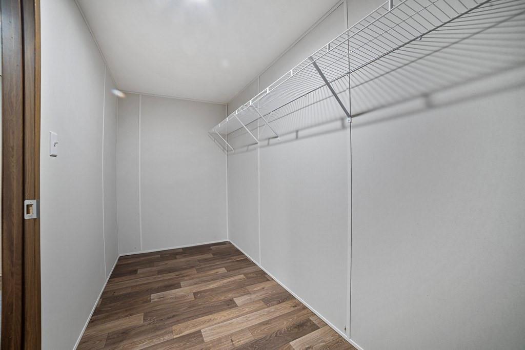 284 Pine Grove Road Gordonville, TX 76245 - Photo 22 of 29 a view of a room with wooden floor