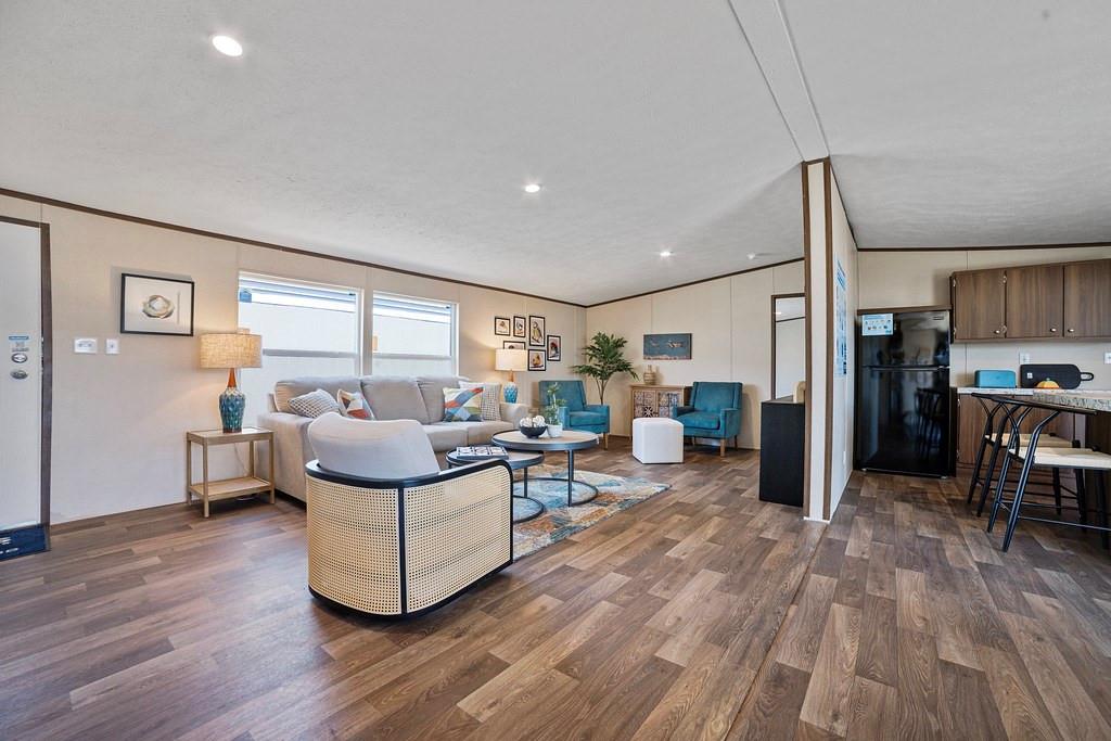 284 Pine Grove Road Gordonville, TX 76245 - Photo 5 of 29 a living room with furniture and a wooden floor