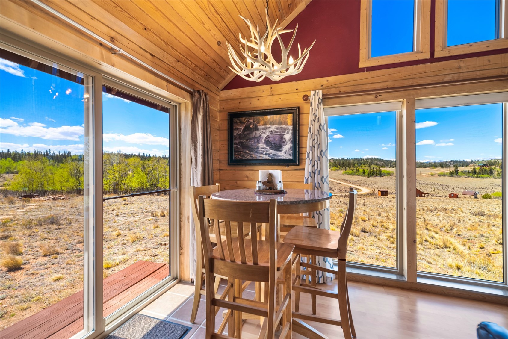 15 Mallard Road Como, CO 80432 - Photo 41 of 49 a view of a dining room with furniture window and wooden floor
