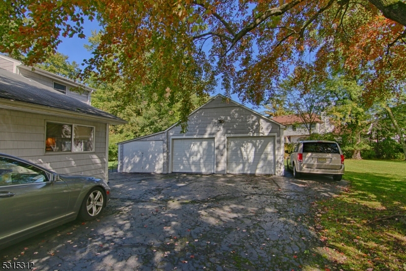 96 Parsippany Road Whippany, NJ 07981 - Photo 2 of 12 a view of a car parked in front of a house