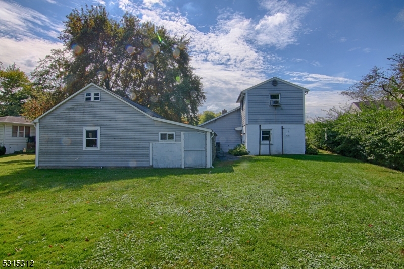 96 Parsippany Road Whippany, NJ 07981 - Photo 4 of 12 a house view with a garden space