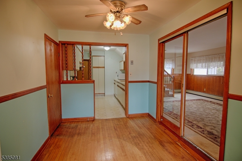 96 Parsippany Road Whippany, NJ 07981 - Photo 7 of 12 wooden floor in an empty room with a window