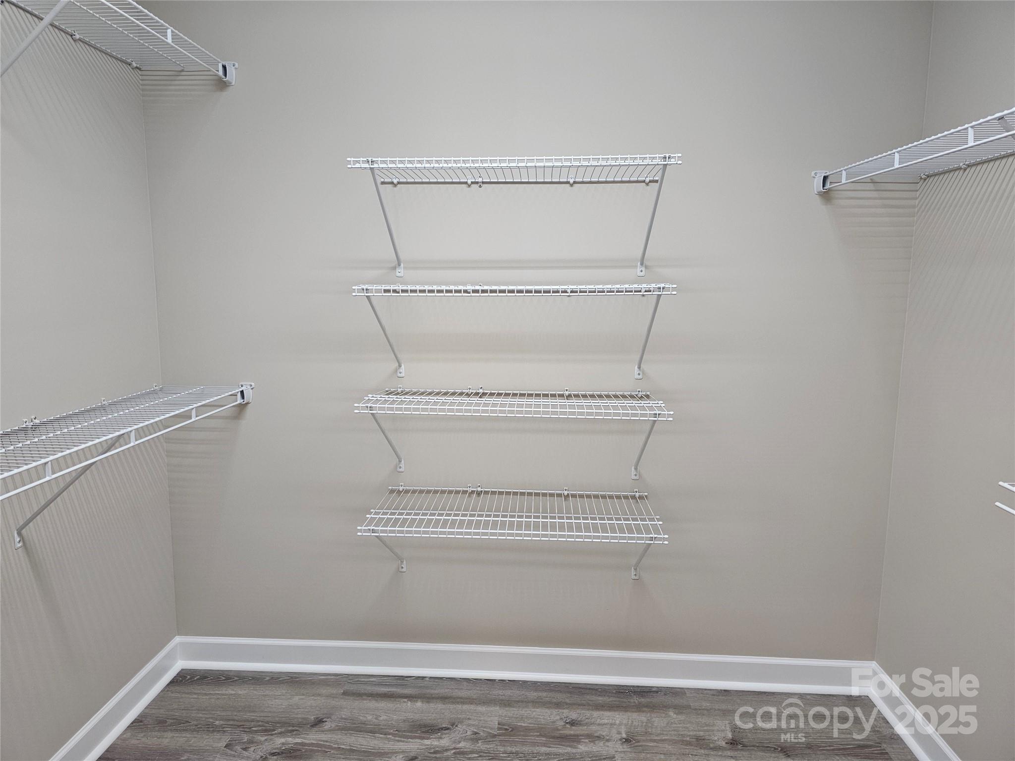 3679 Travertine Drive Lancaster, SC 29720 - Photo 13 of 26 a view of walk in closet with empty racks