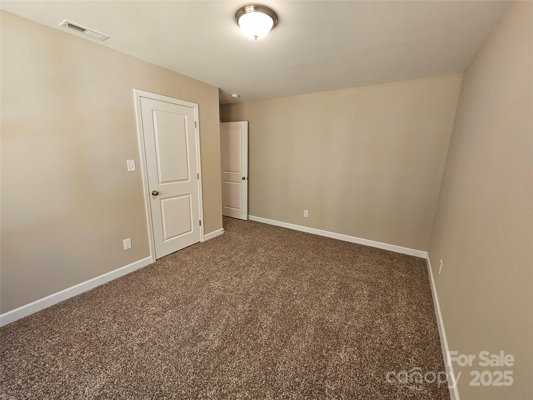 3679 Travertine Drive Lancaster, SC 29720 - Photo 18 of 26 an empty room with closet
