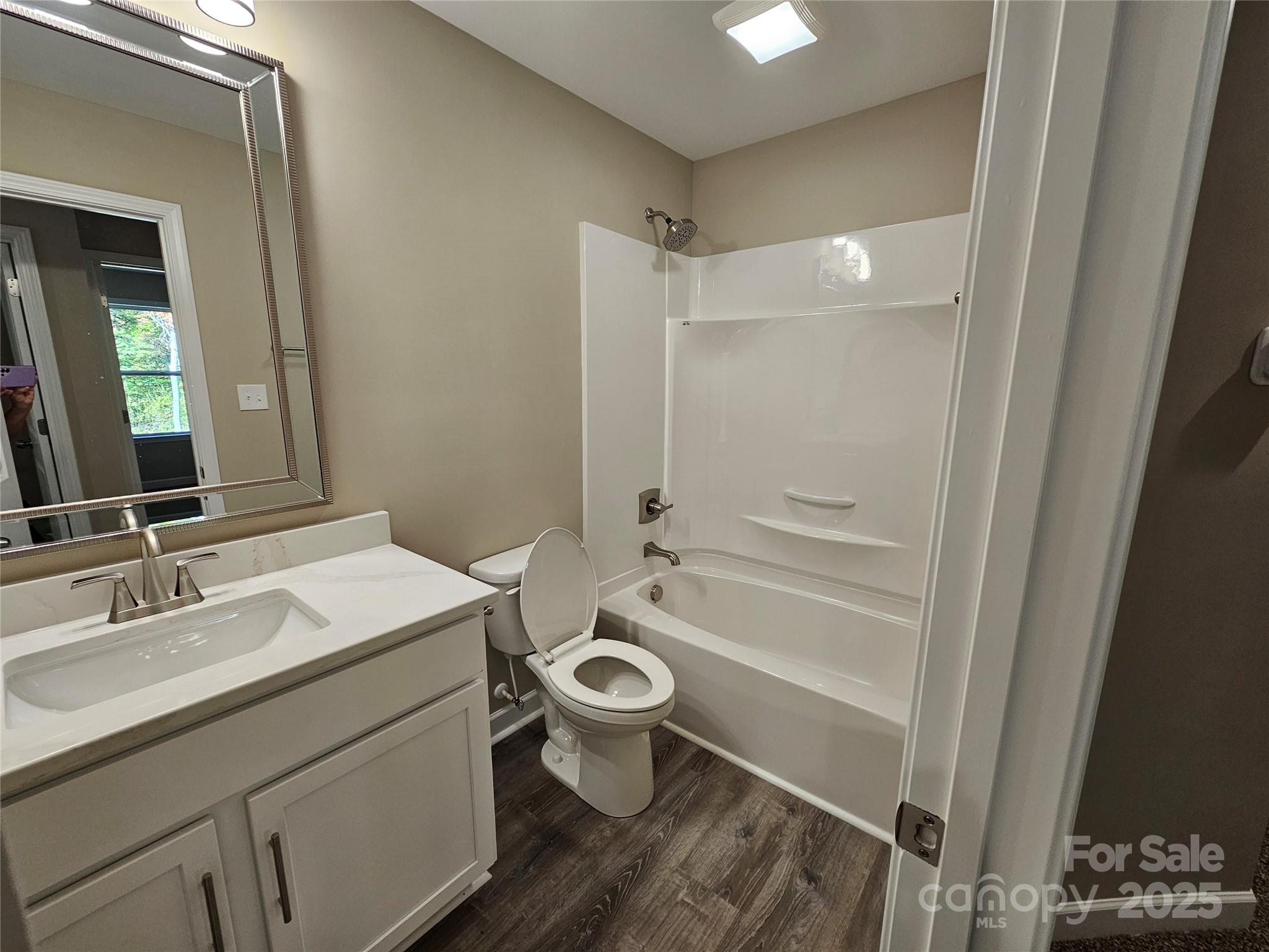 3679 Travertine Drive Lancaster, SC 29720 - Photo 21 of 26 a bathroom with a sink a toilet and shower