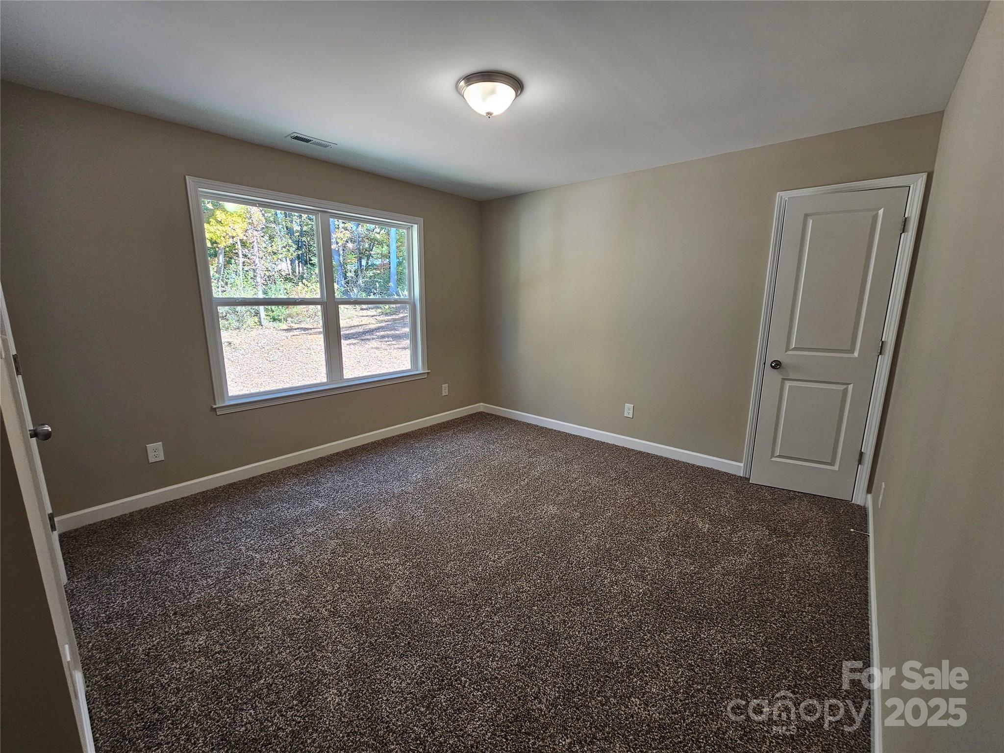 3679 Travertine Drive Lancaster, SC 29720 - Photo 22 of 26 a view of an empty room with a window