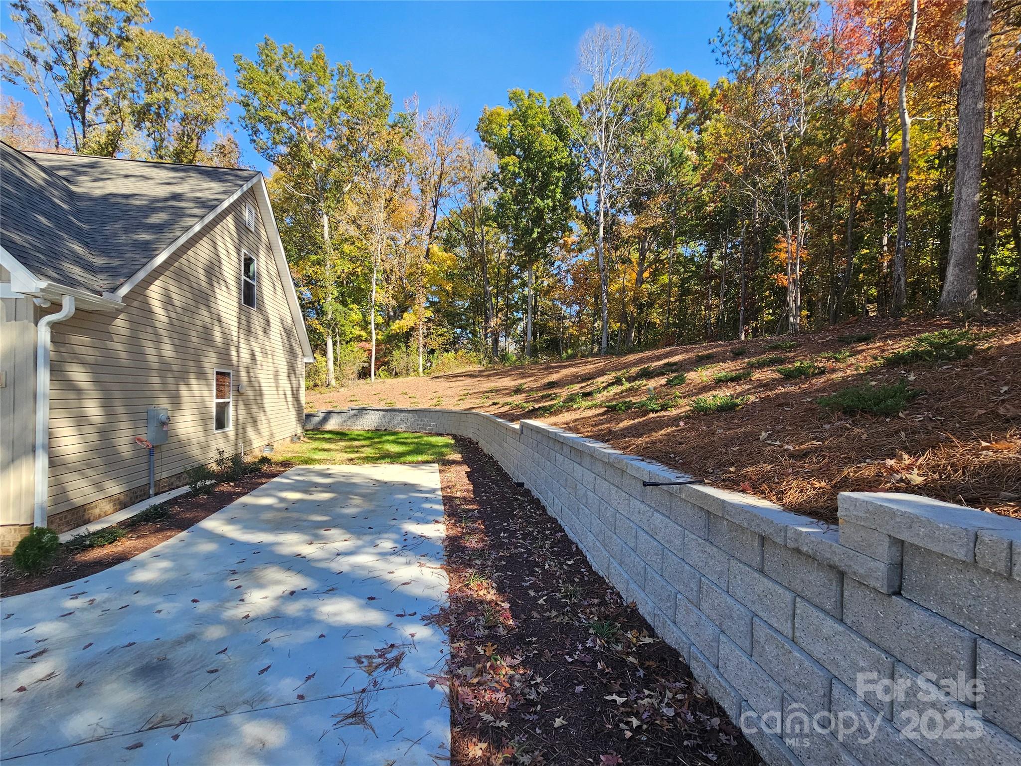 3679 Travertine Drive Lancaster, SC 29720 - Photo 26 of 26 a view of a backyard with plants