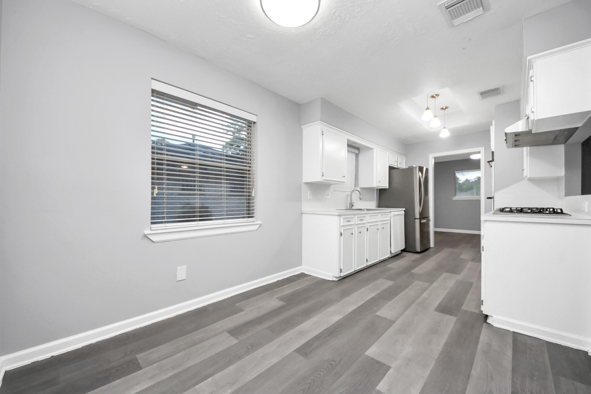 2522 Nightowl Trail Spring, TX 77373 - Photo 12 of 40 a view of kitchen with sink and refrigerator