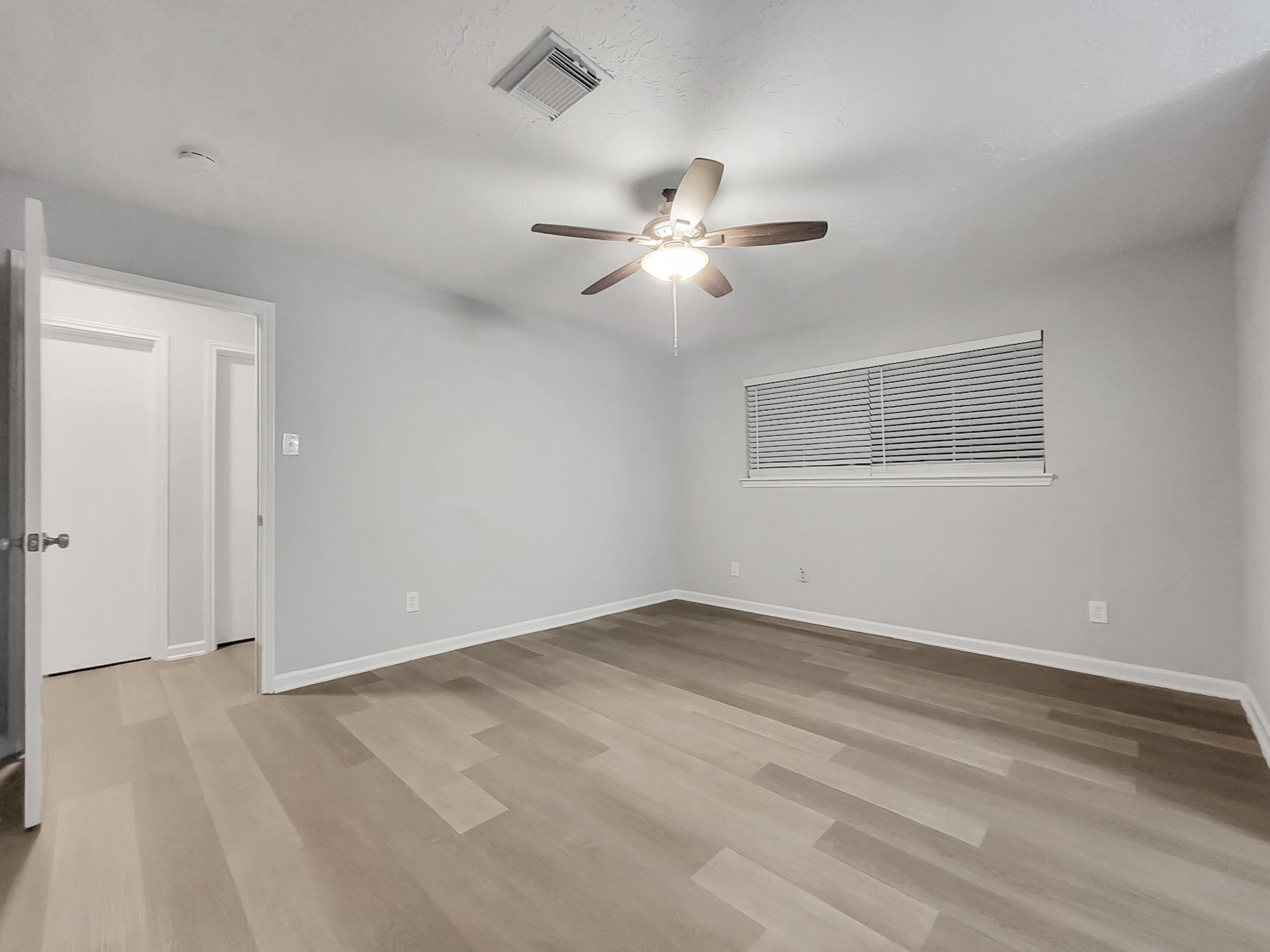 2522 Nightowl Trail Spring, TX 77373 - Photo 19 of 40 a view of empty room with chandelier fan and window
