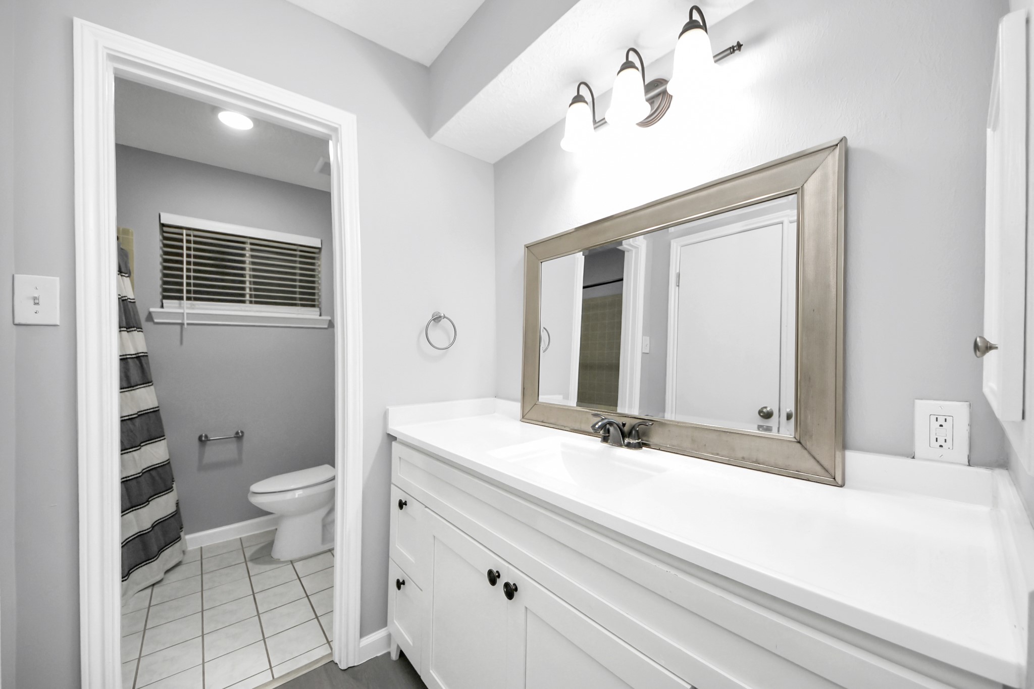 2522 Nightowl Trail Spring, TX 77373 - Photo 28 of 40 a bathroom with a sink a toilet and a mirror