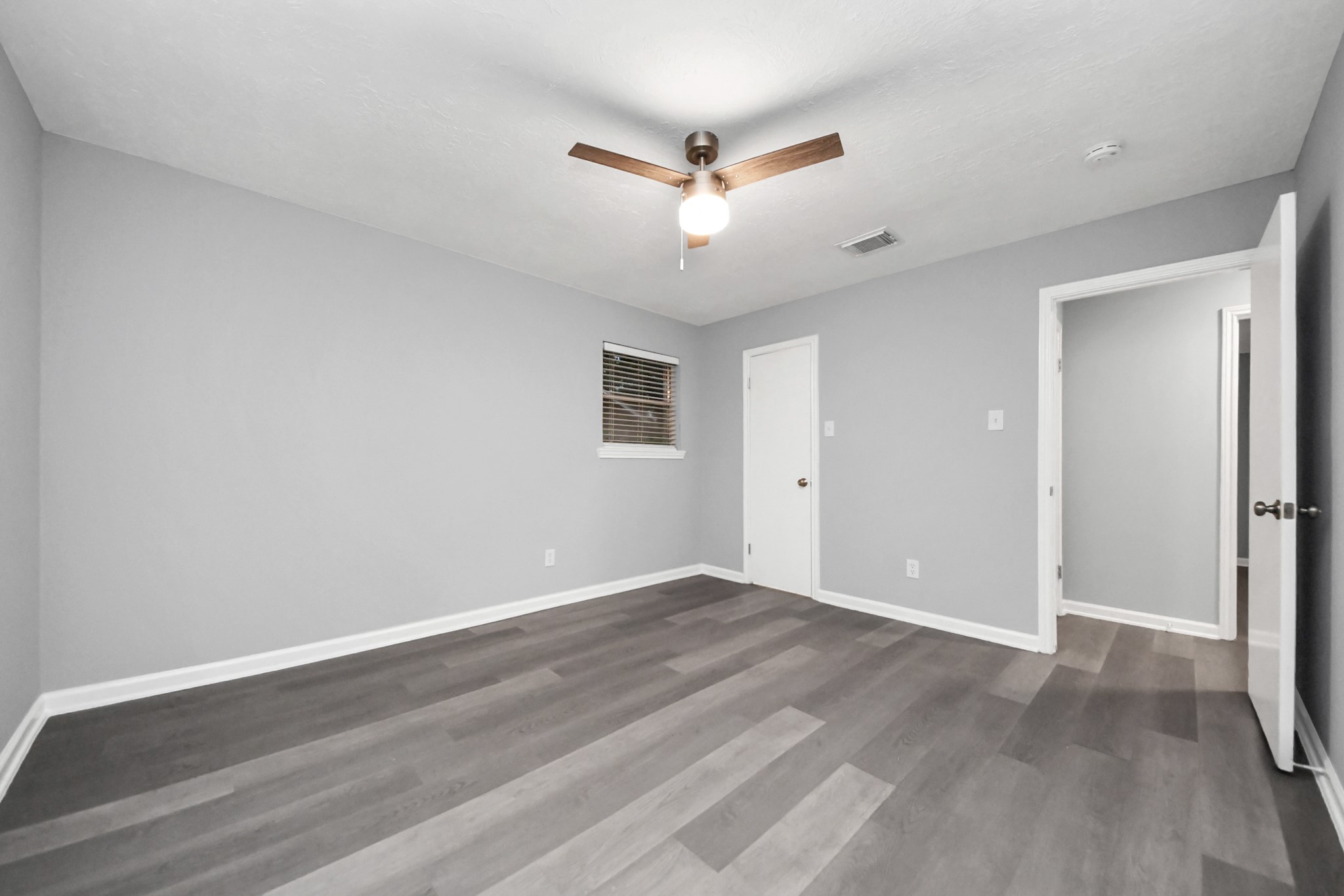 2522 Nightowl Trail Spring, TX 77373 - Photo 31 of 40 a view of an empty room with wooden floor