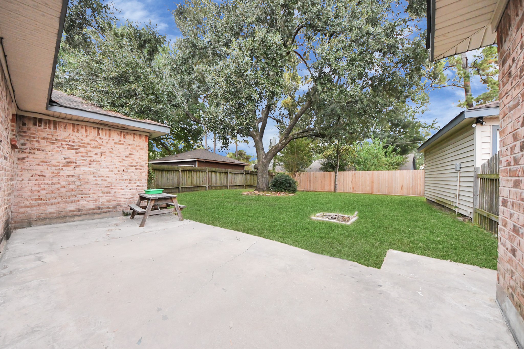 2522 Nightowl Trail Spring, TX 77373 - Photo 32 of 40 a view of a backyard with sitting area