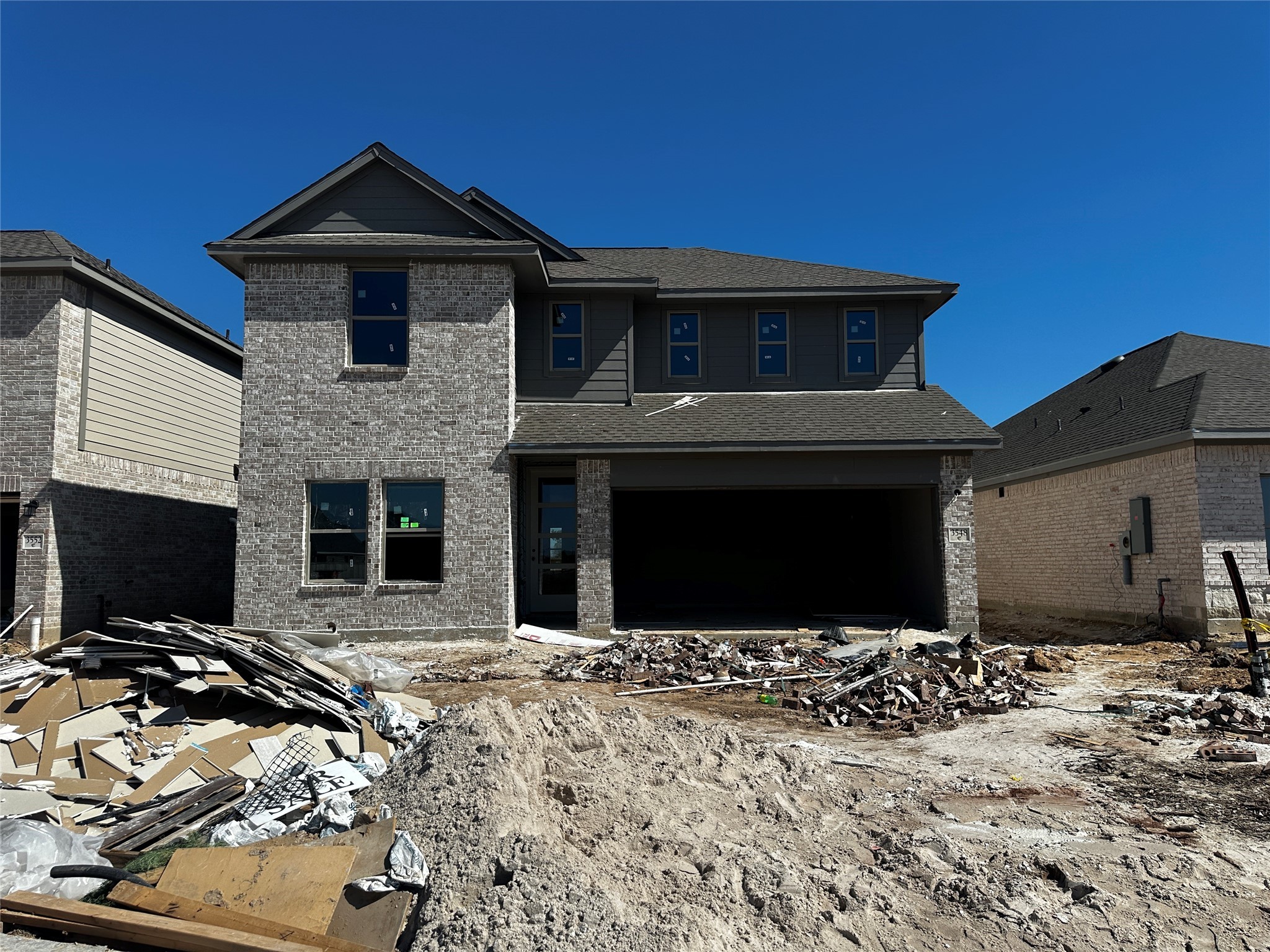 3548 Atlas Pt Lane Angleton, TX 77515 - Photo 9 of 16 a front view of a house with a yard