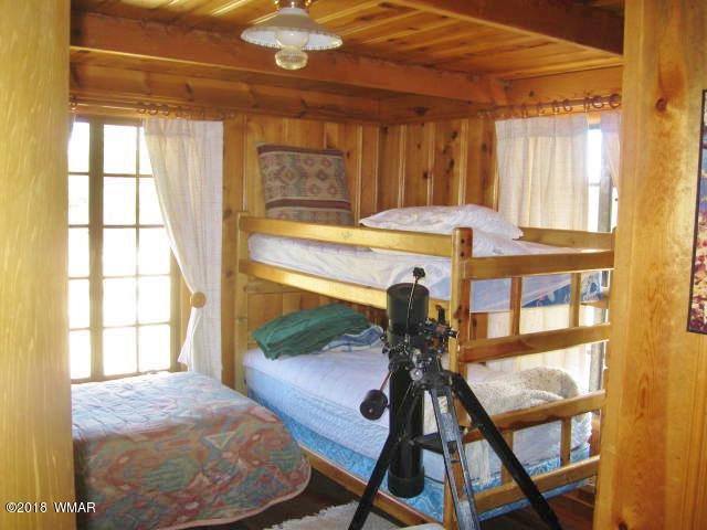 4 County Road Greer, AZ 85927 - Photo 15 of 24 a view of a room with gym equipment