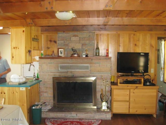 4 County Road Greer, AZ 85927 - Photo 6 of 24 a living room with furniture and a flat screen tv