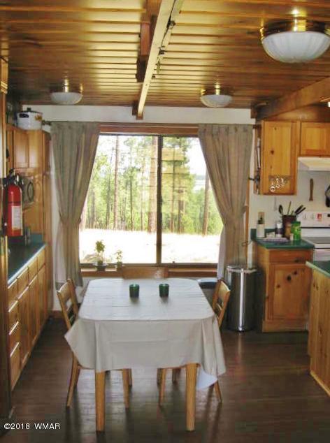 4 County Road Greer, AZ 85927 - Photo 7 of 24 a dining room with furniture and window
